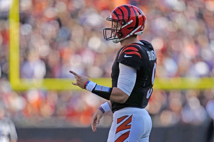 Oct 7, 2022; Cincinnati, OH, USA; Cincinnati Bengals quarterback Joe Burrow (9) shares words with center Ted Karras (64) Ofer being sacked in the third quarter of the NFL Week 7 game between the Cincinnati Bengals and the Atlanta Falcons at Paycor Stadium in downtown Cincinnati on Sunday, Oct. 23, 2022. The Bengals won 35-17. Mandatory Credit: Sam Greene-The Enquirer